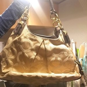 Vintage Cloth Tan Coach purse.